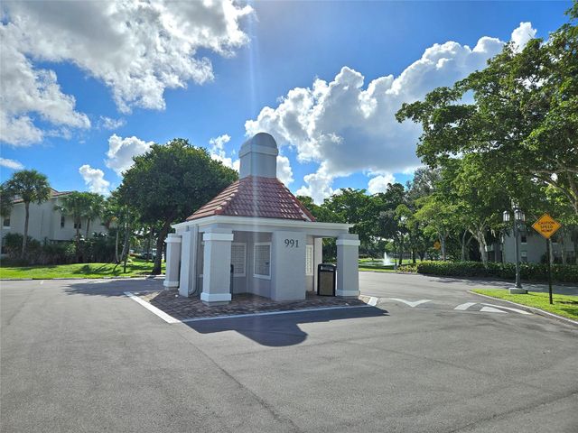 701 Lyons Road 13103, Coconut Creek, FL 33063