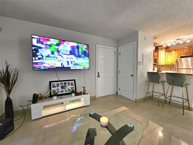 701 Lyons Road 13103, Coconut Creek, FL 33063