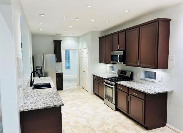 9539 Still Cove Lane, Houston, TX 77089