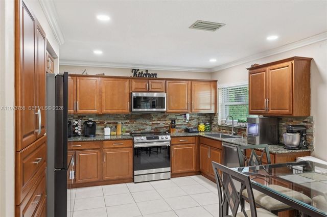 11573 NW 39th Pl, Coral Springs, FL 33065