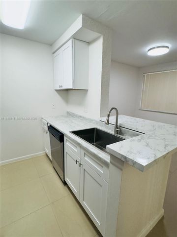 2851 N Oakland Forest Dr 110, Oakland Park, FL 33309