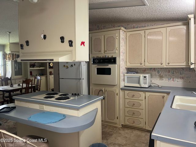 1945 Big Cypress Street NE, Palm Bay, FL 32905