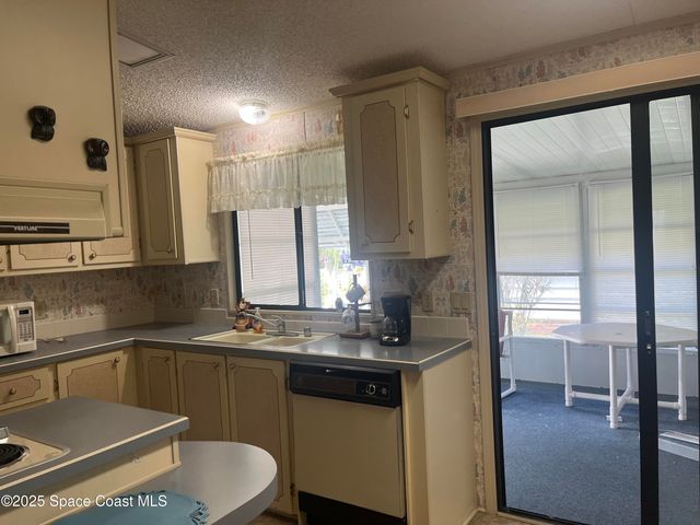 1945 Big Cypress Street NE, Palm Bay, FL 32905