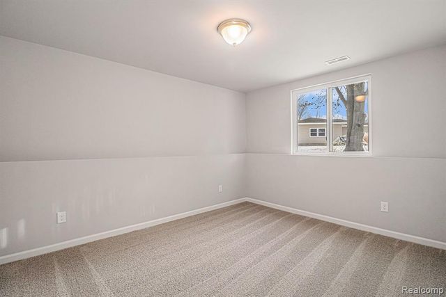 3163 Wild Orchid Lane, Burton, MI 48519