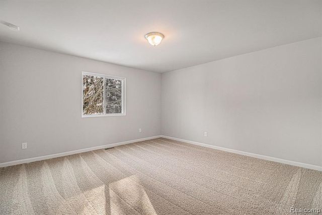 3163 Wild Orchid Lane, Burton, MI 48519