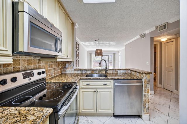 2230 N Cypress Bend Drive 108, Pompano Beach, FL 33069