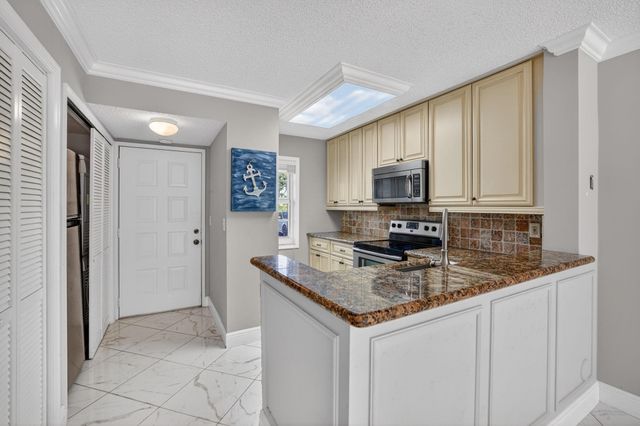 2230 N Cypress Bend Drive 108, Pompano Beach, FL 33069