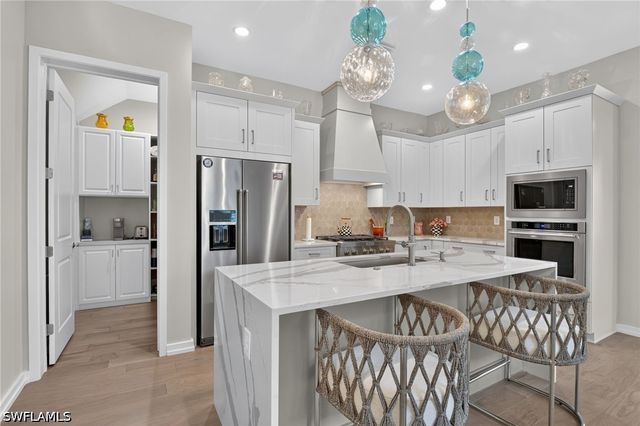14596 Kingfisher LOOP, Naples, FL 34120