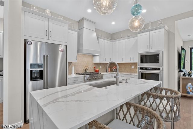 14596 Kingfisher LOOP, Naples, FL 34120
