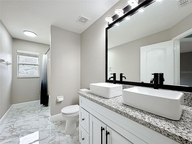 697 WINDING LAKE DRIVE, Clermont, FL 34711