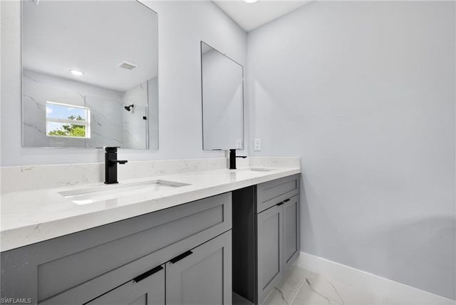 704 Carbon ST E, Lehigh Acres, FL 33974