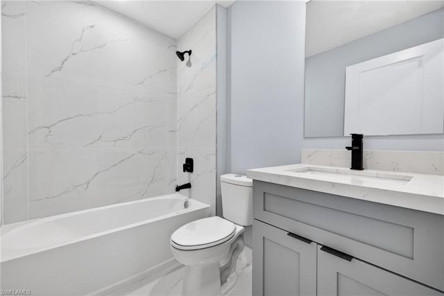 704 Carbon ST E, Lehigh Acres, FL 33974