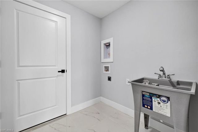 704 Carbon ST E, Lehigh Acres, FL 33974