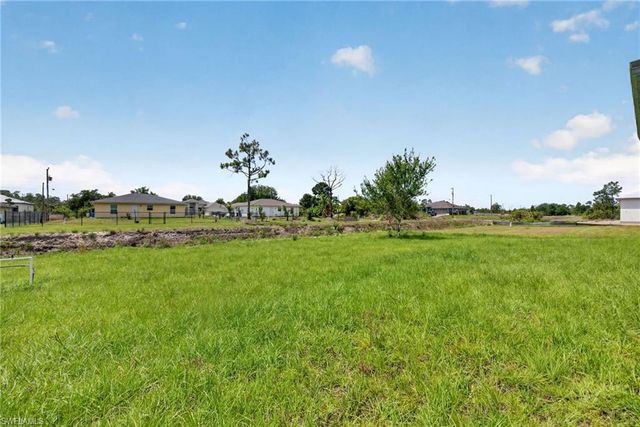 704 Carbon ST E, Lehigh Acres, FL 33974