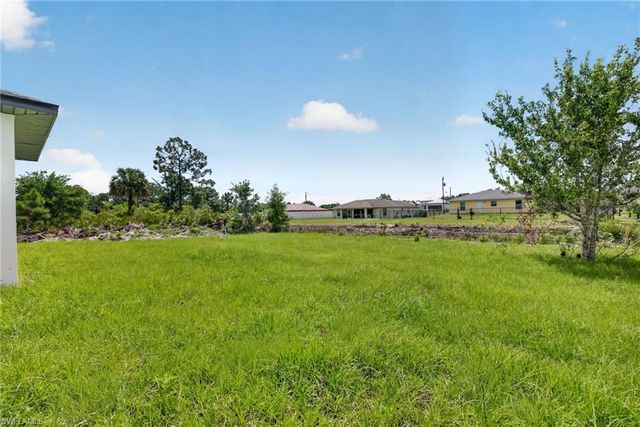 704 Carbon ST E, Lehigh Acres, FL 33974