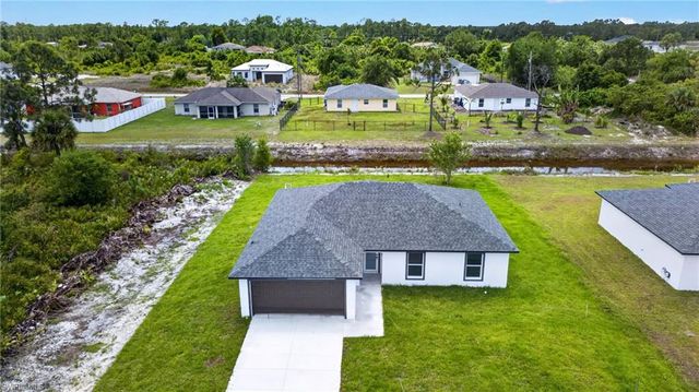 704 Carbon ST E, Lehigh Acres, FL 33974