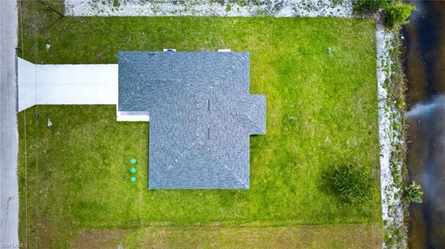 704 Carbon ST E, Lehigh Acres, FL 33974