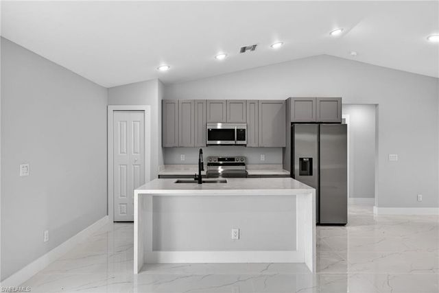 704 Carbon ST E, Lehigh Acres, FL 33974