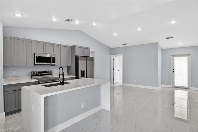 704 Carbon ST E, Lehigh Acres, FL 33974