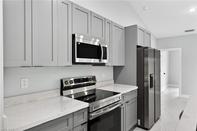 704 Carbon ST E, Lehigh Acres, FL 33974