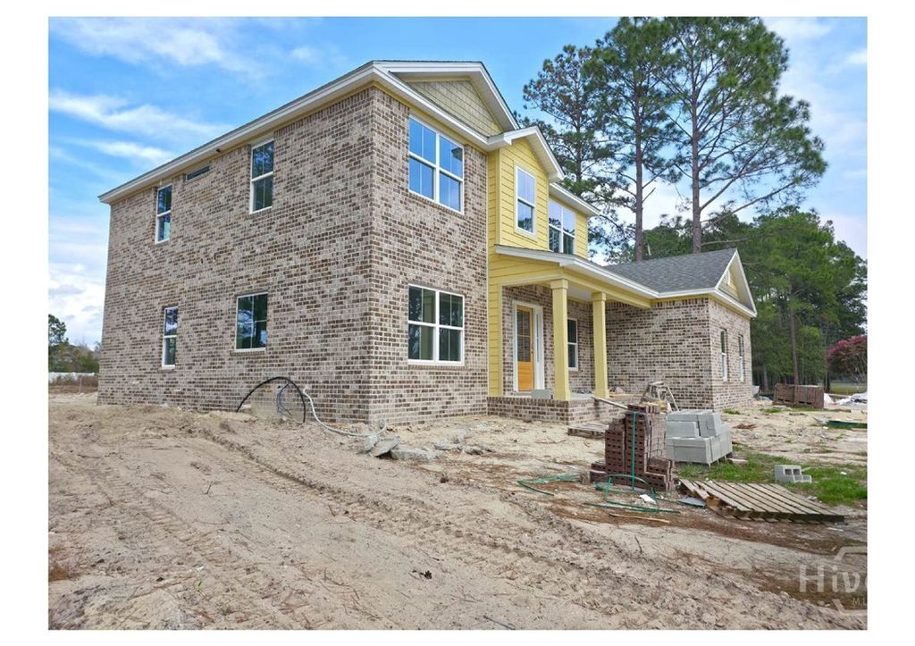 Image 3 of property listing at 208 Cypress Lake Drive, Bloomingdale, GA 31302