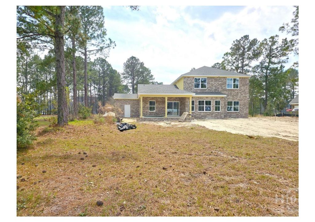 Image 5 of property listing at 208 Cypress Lake Drive, Bloomingdale, GA 31302