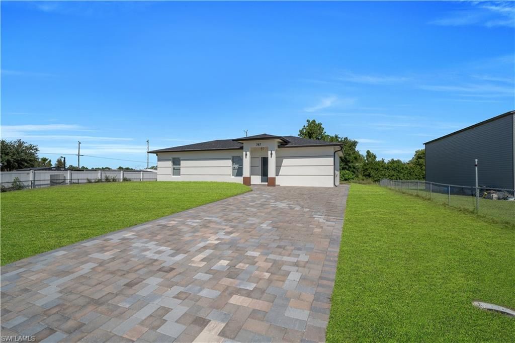747 Fleming AVE S, LEHIGH ACRES, FL 33974 — photo 2