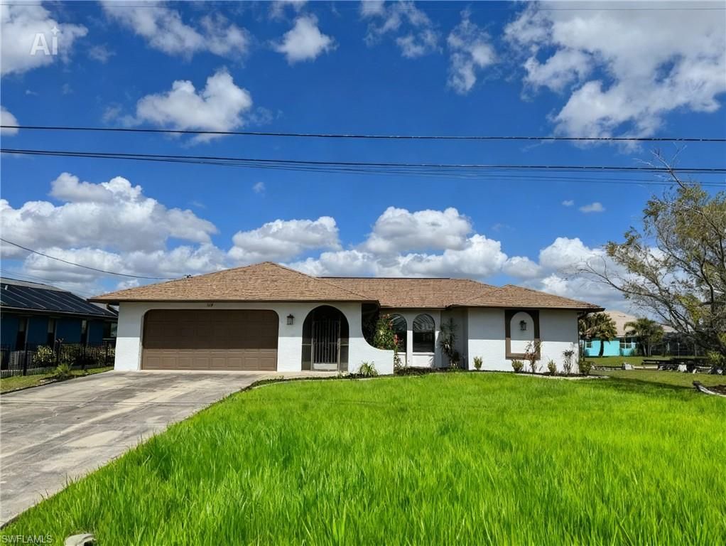 Image 1 of property listing at 115 6th ST, Cape Coral, FL 33990