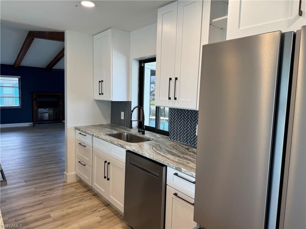 Image 5 of property listing at 115 6th ST, Cape Coral, FL 33990
