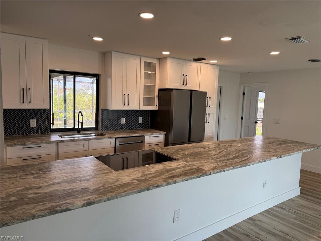 Image 6 of property listing at 115 6th ST, Cape Coral, FL 33990