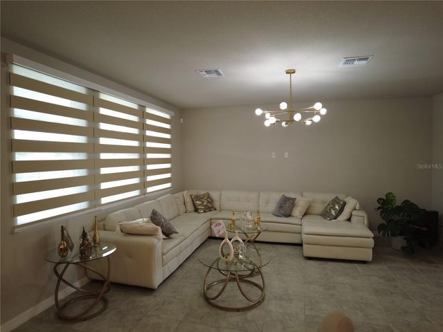 230 WHISTLING DUCK TRAIL, St Cloud, FL 34771