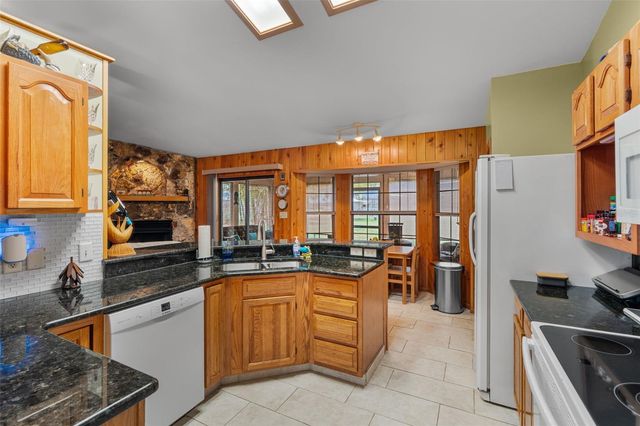 14334 RAINTREE BOULEVARD, Grand Island, FL 32735