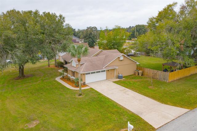 14334 RAINTREE BOULEVARD, Grand Island, FL 32735