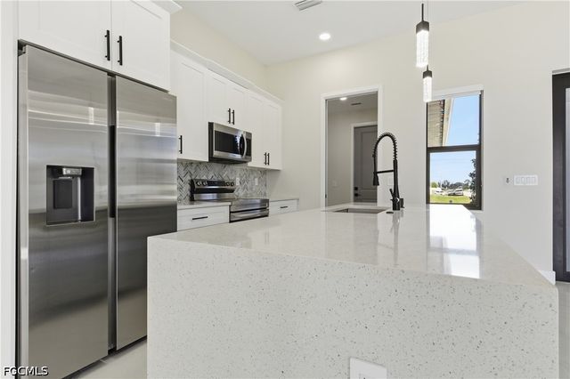 1442 NE 33rd LN, Cape Coral, FL 33909
