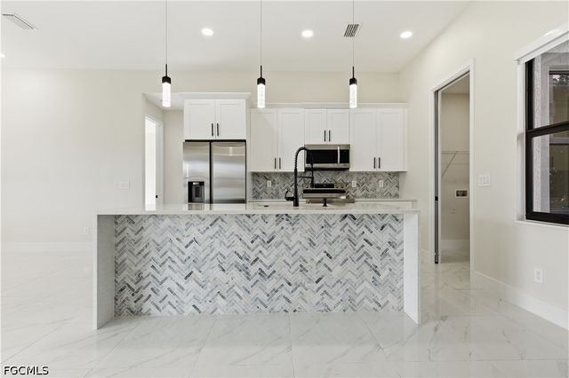 1442 NE 33rd LN, Cape Coral, FL 33909