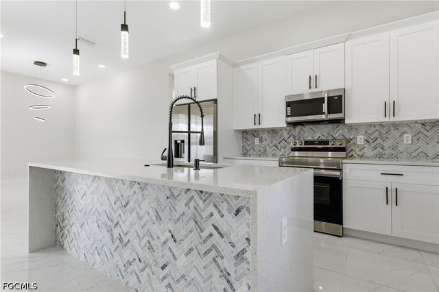 1442 NE 33rd LN, Cape Coral, FL 33909