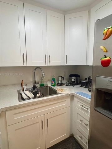 5050 NW 7th St 309, Miami, FL 33126