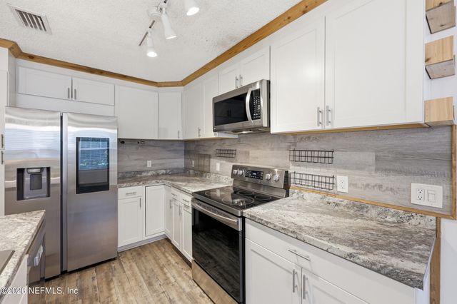 914 HIBERNIA FOREST Drive, Fleming Island, FL 32003