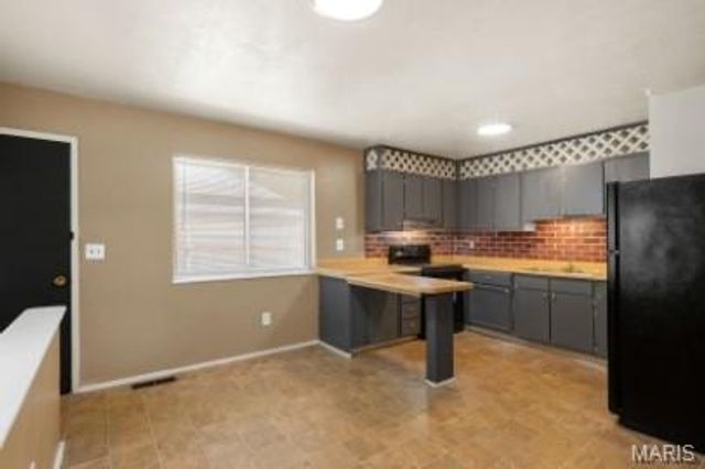 1114 Ransome Court, Florissant, MO 63031