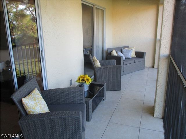 2684 KINGS LAKE BLVD 203, Naples, FL 34112