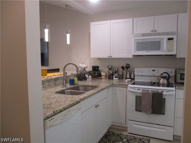 2684 KINGS LAKE BLVD 203, Naples, FL 34112
