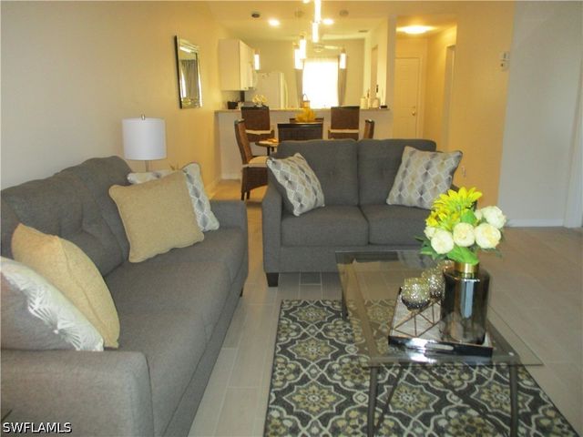 2684 KINGS LAKE BLVD 203, Naples, FL 34112