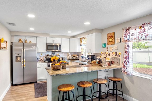 2152 ARCADIA ROAD, Holiday, FL 34690