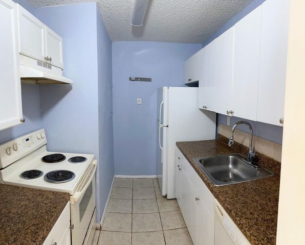 1133 N Benoist Farms Road 105, West Palm Beach, FL 33411