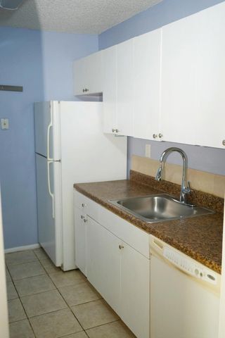 1133 N Benoist Farms Road 105, West Palm Beach, FL 33411