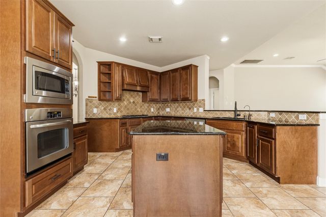 10702 Winding Green Drive, Humble, TX 77338