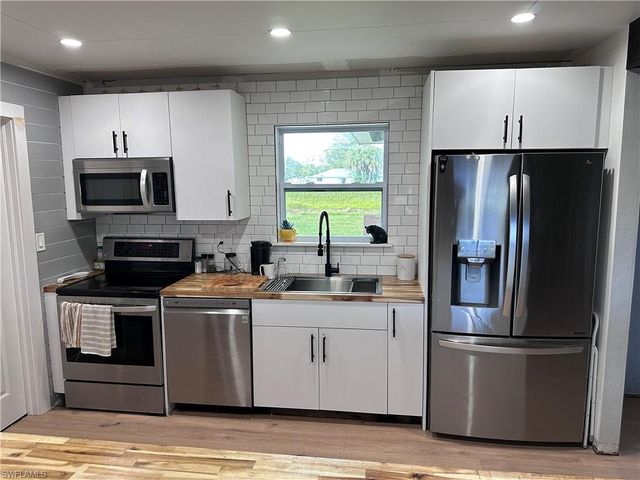 13 E Jasmine RD, Lehigh Acres, FL 33936