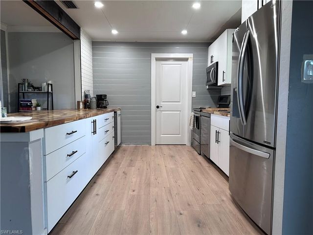 13 E Jasmine RD, Lehigh Acres, FL 33936