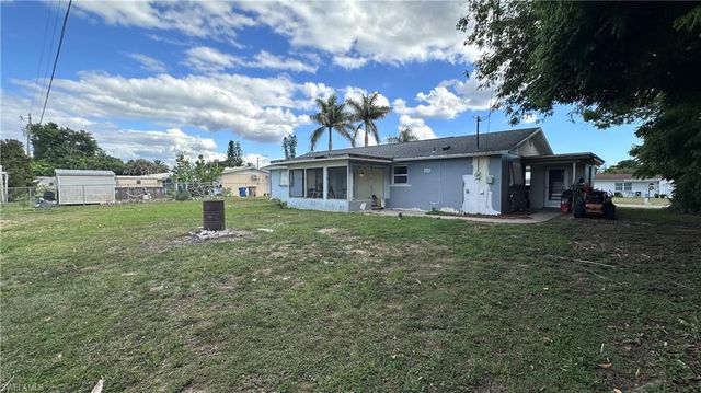 13 E Jasmine RD, Lehigh Acres, FL 33936