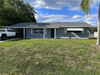 13 E Jasmine RD, Lehigh Acres, FL 33936